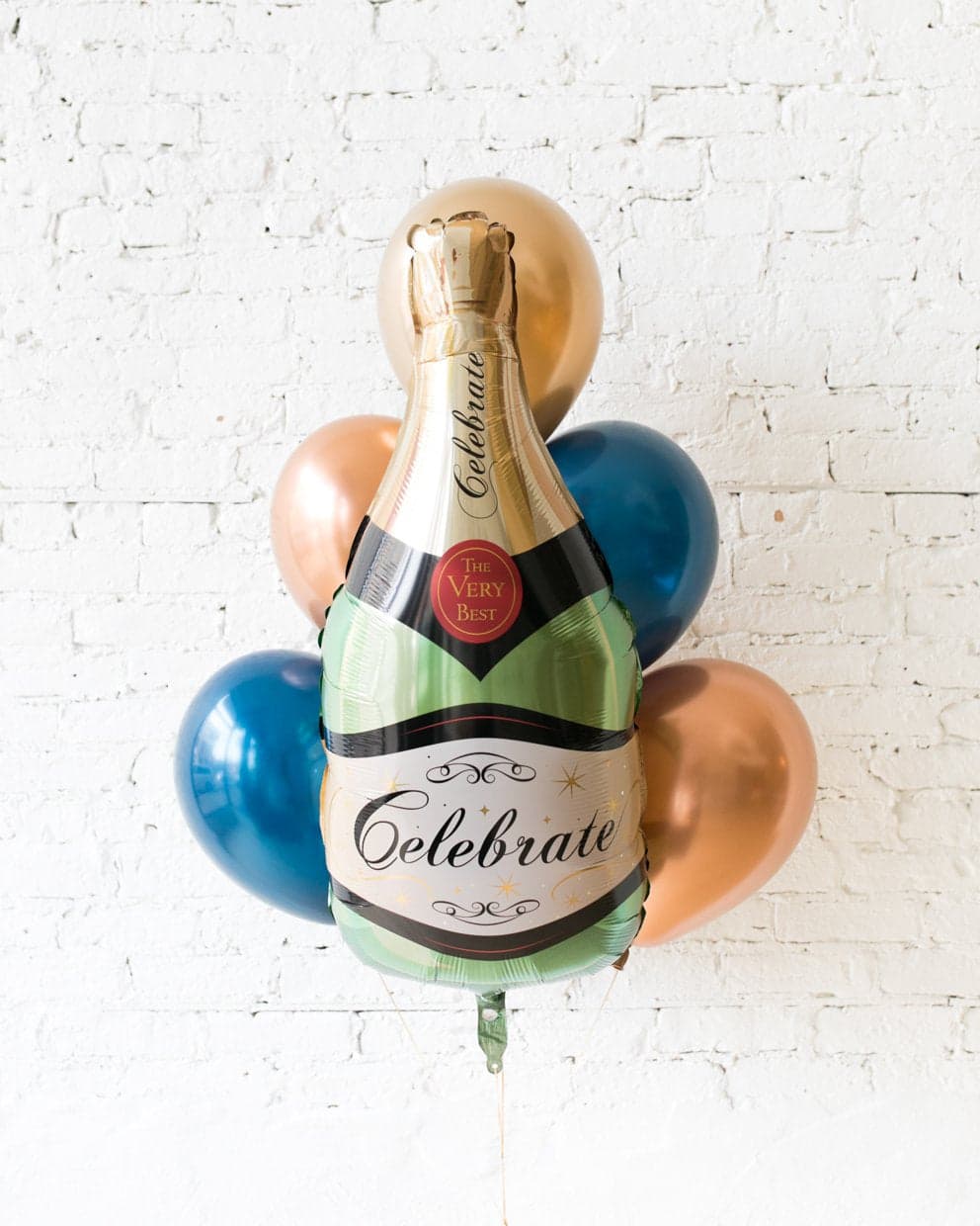 GIFT-Gold, Navy and Copper Palette Champagne Bottle Foil and 11in Balloons – bouquet of 7 | Rental